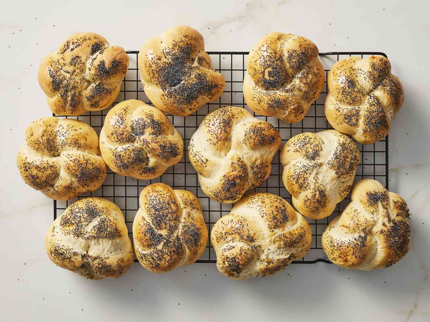 Kaiser rolls cooling on wire rack