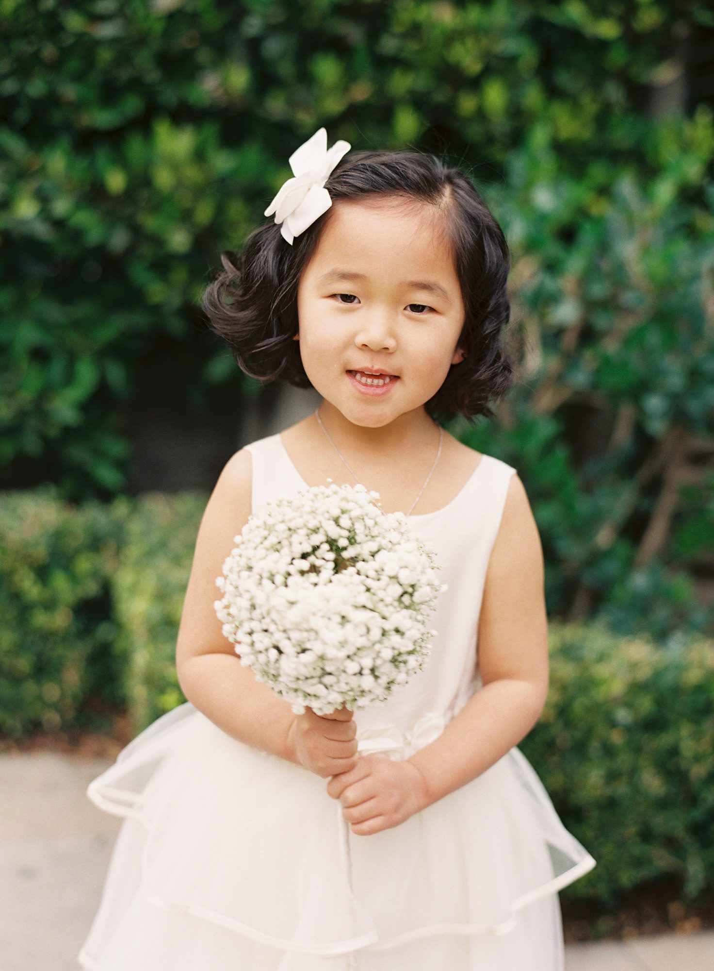 Flower Girl Hairstyle Curls and Bow