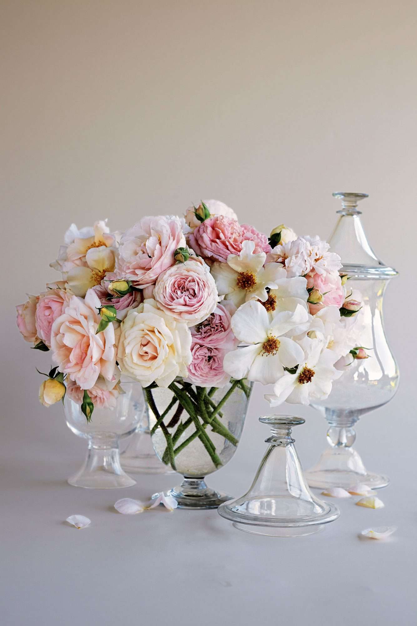 flower arrangement roses in jars