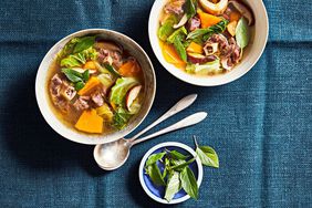 beef pumpkin and shiitake soup served with fresh basil