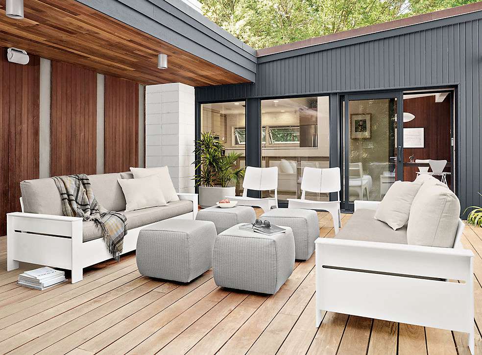 white and gray Room and Board patio furniture