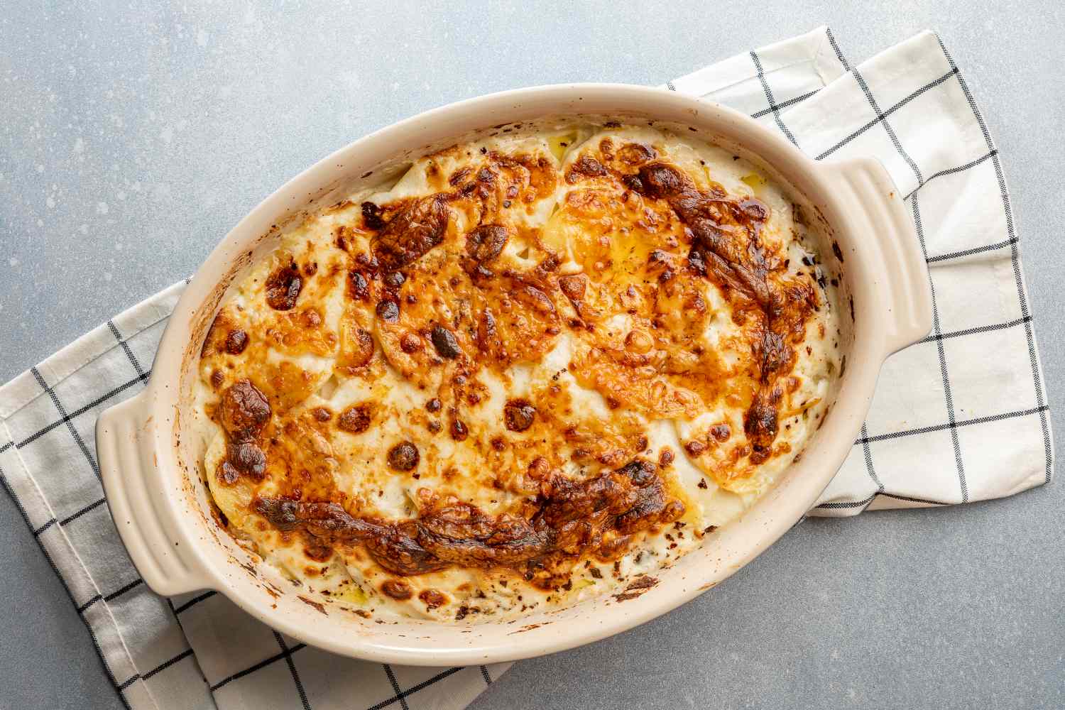 scalloped potatoes recipe baked and ready to serve