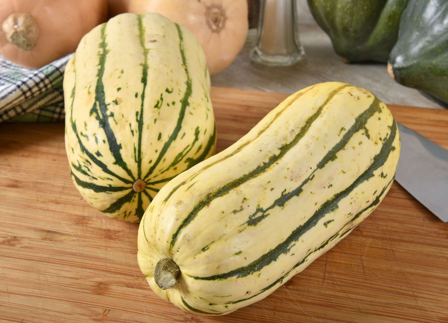 Delicata squash on cutting board