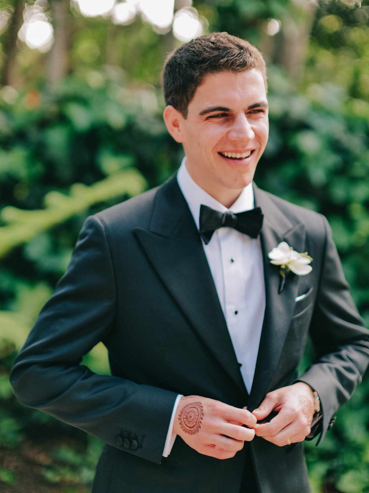 groom with orchid 