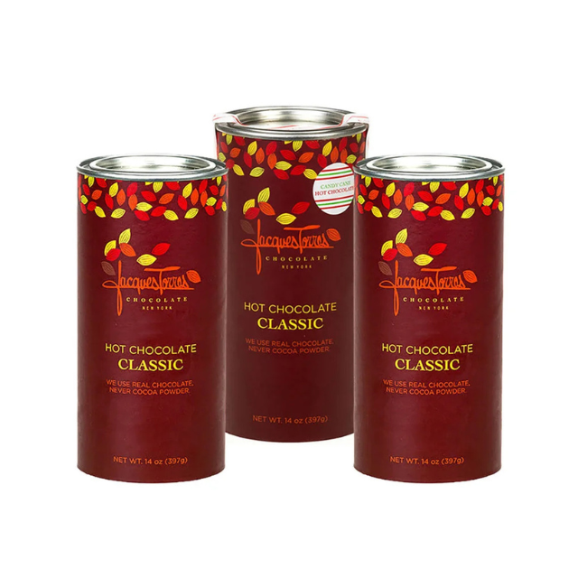 Three containers of classic hot chocolate mix arranged side by side