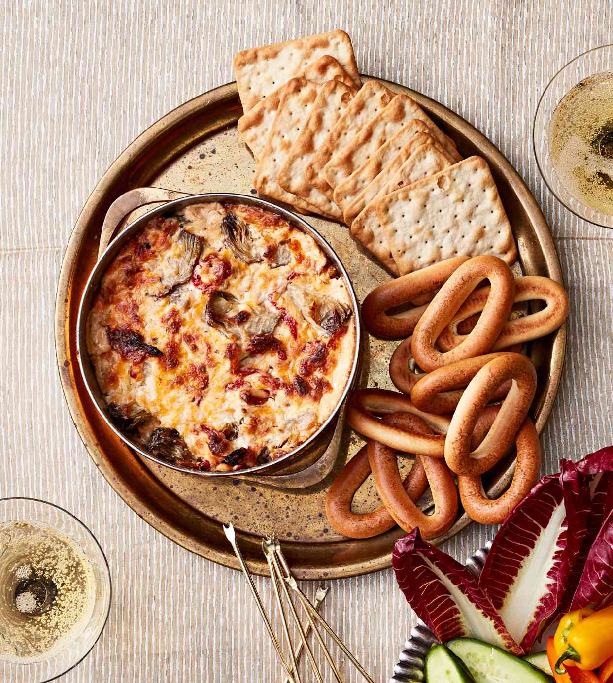 three-cheese artichoke-and-sun-dried-tomato dip