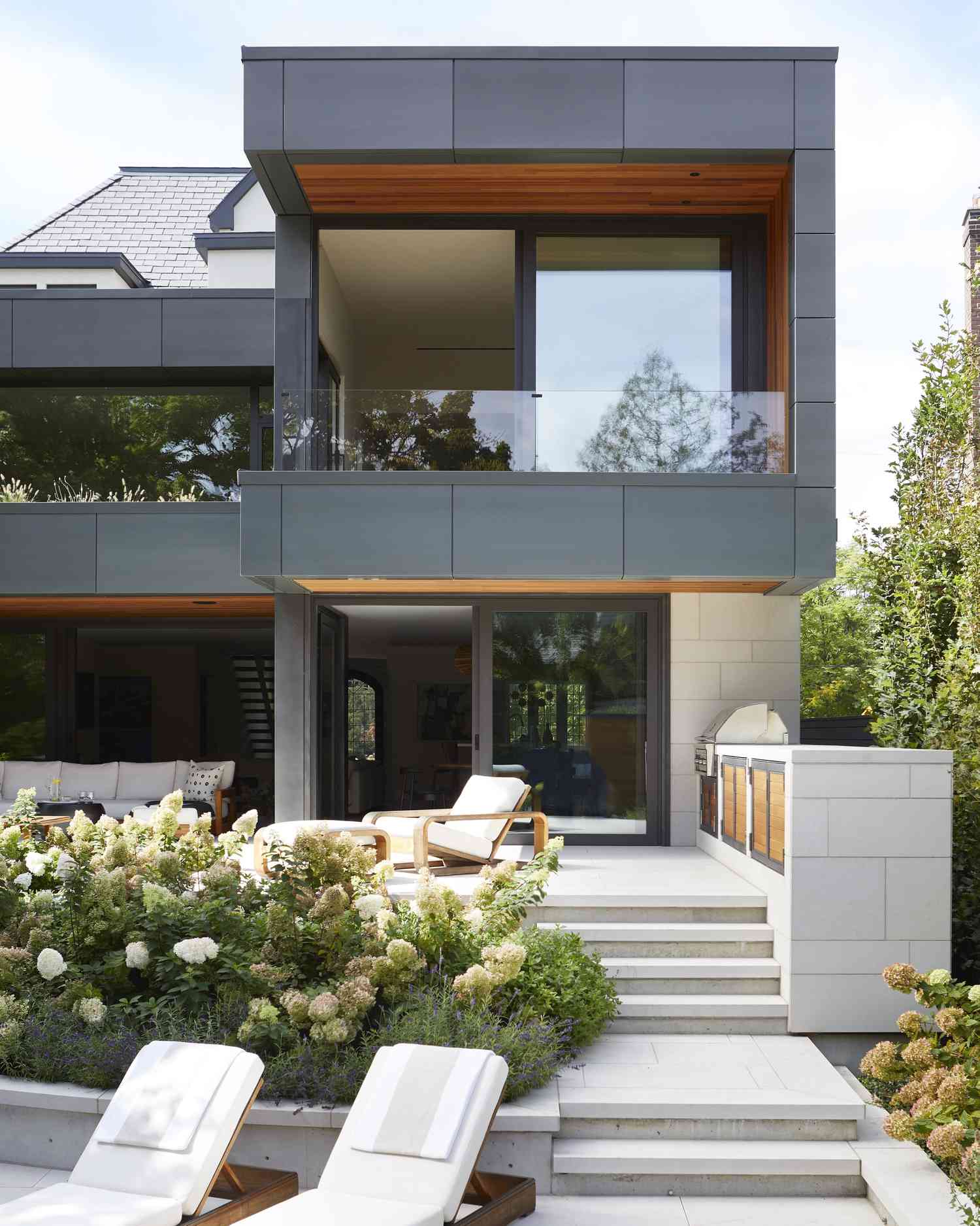 an tiered outdoor space off of a modern home