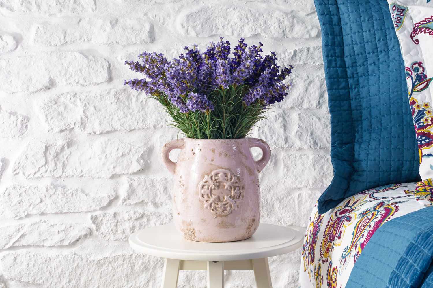 Lavender plant next to bed