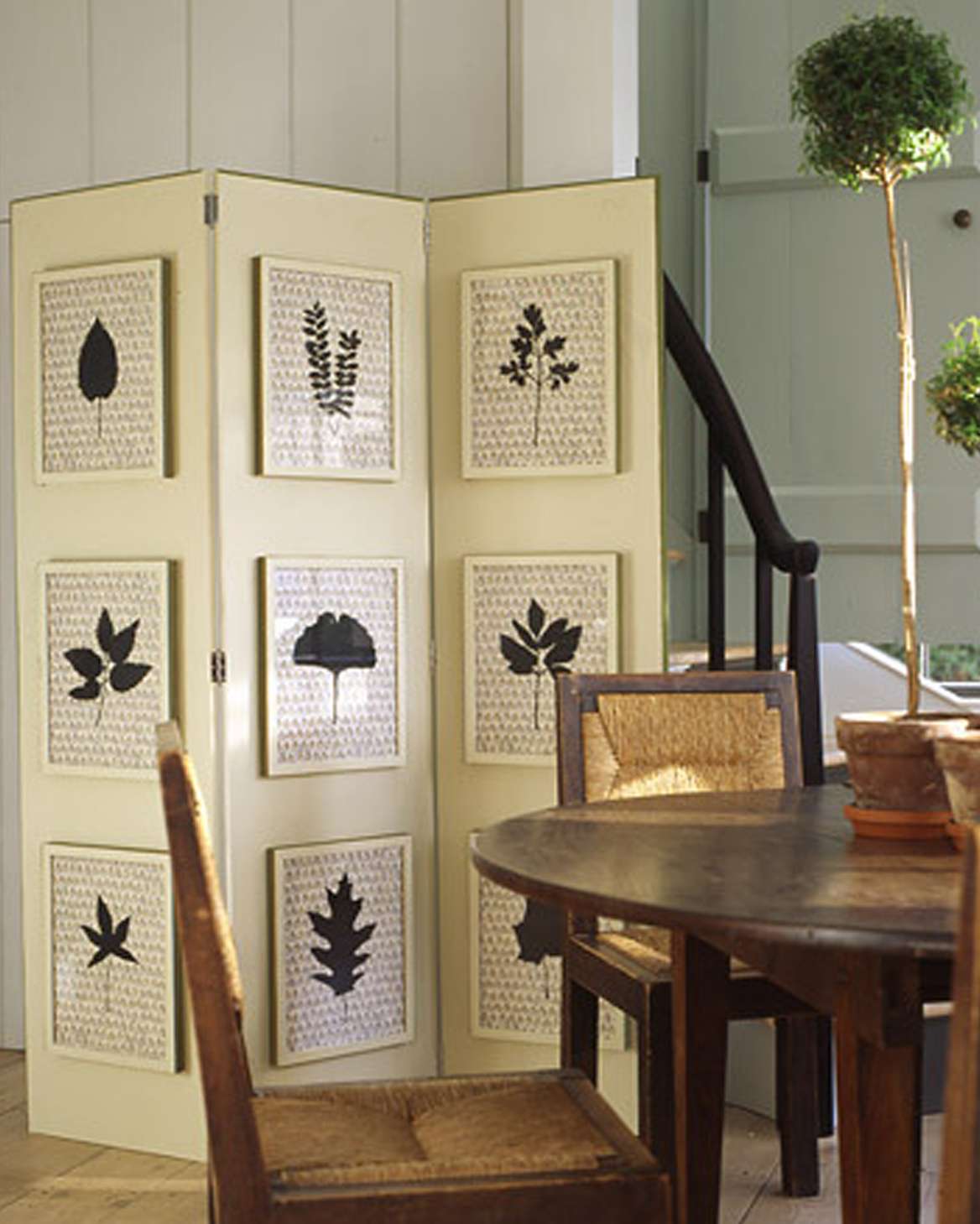 room divider with natural accents and leaf prints