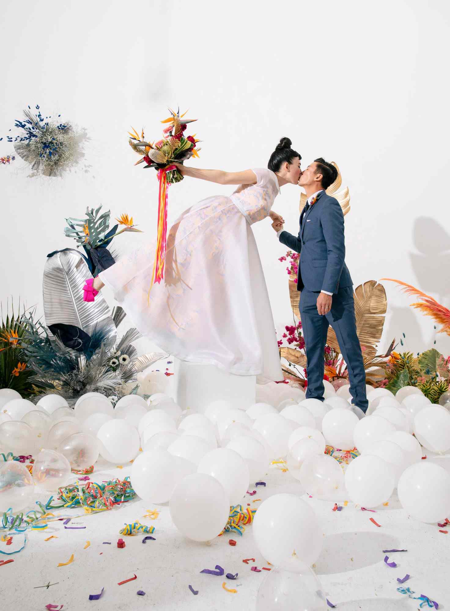 tashina huy colorful wedding couple kiss