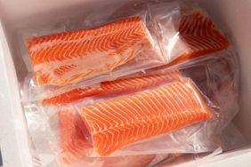 Packaged salmon fillets arranged in a container