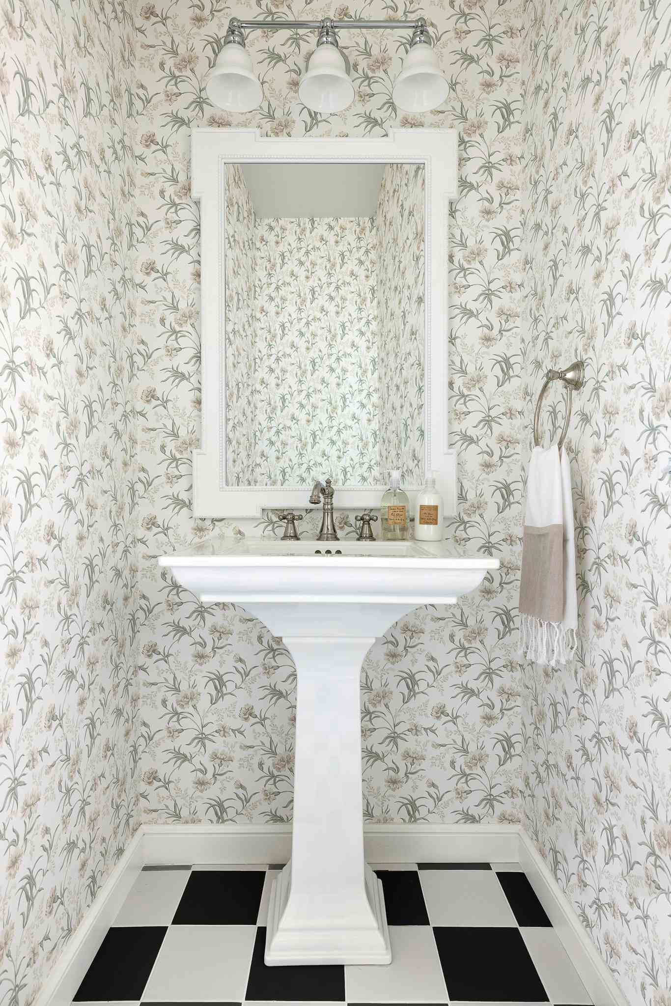 feminine florals and white jewel box bathroom