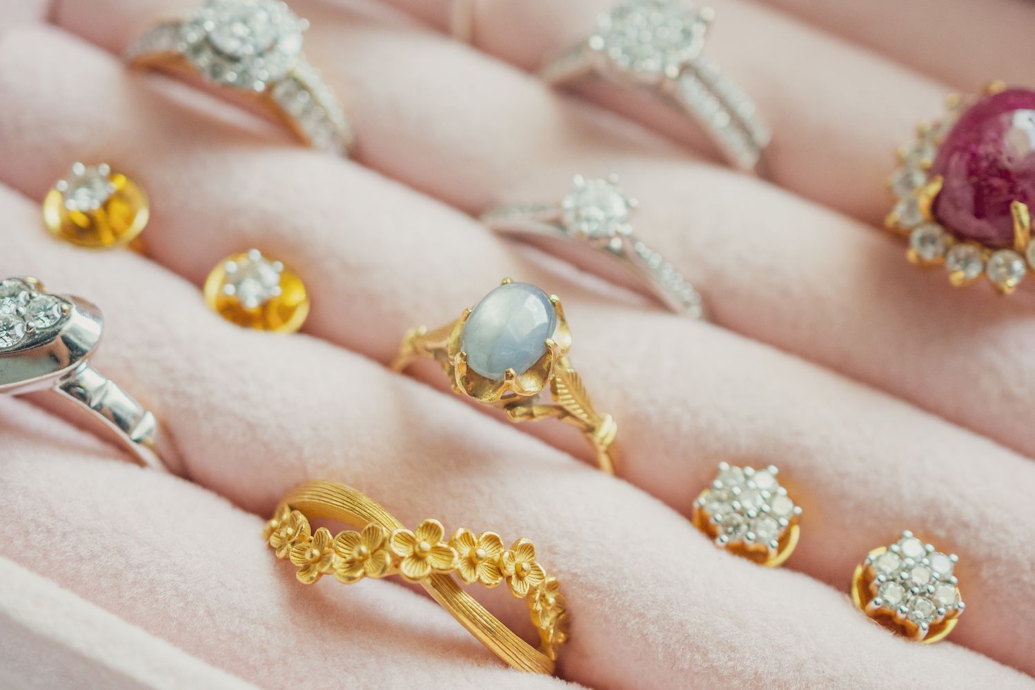 Gemstone rings and vintage jewelry in jewelry box