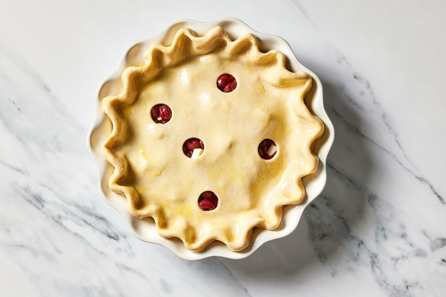 Martha's Sour Cherry Pie with crimped edges ready to bake