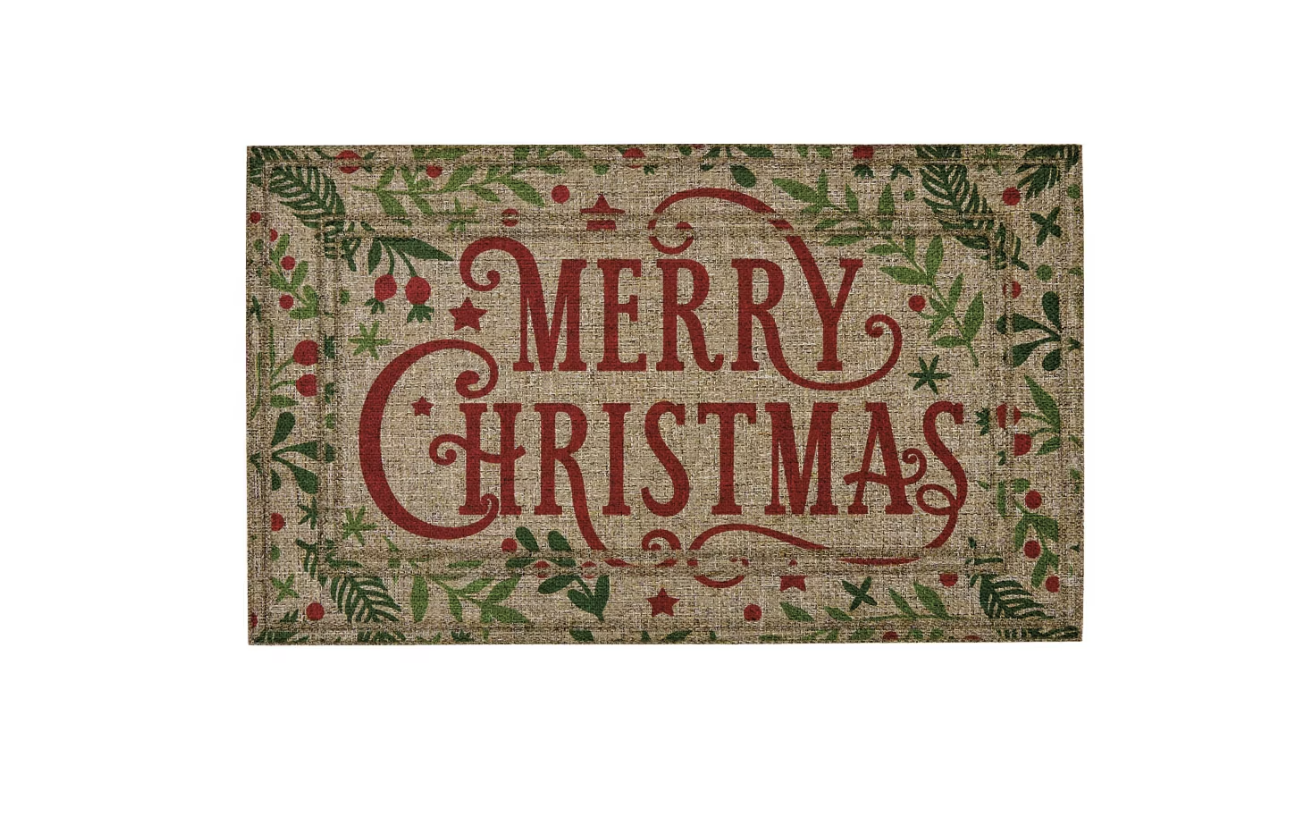 Holiday doormat with the words Merry Christmas and a festive design of leaves and berries