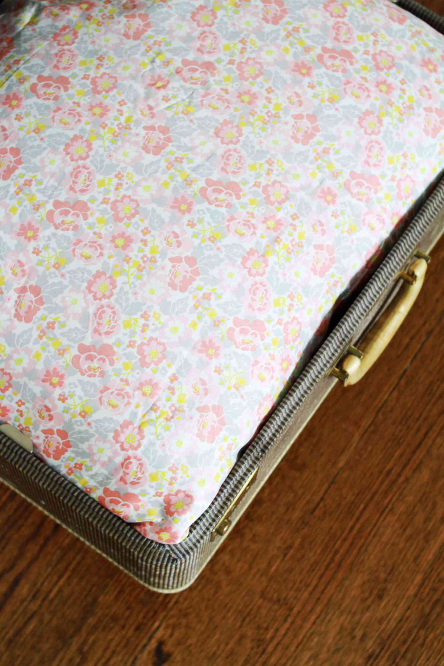 Suitcase with pillow in it