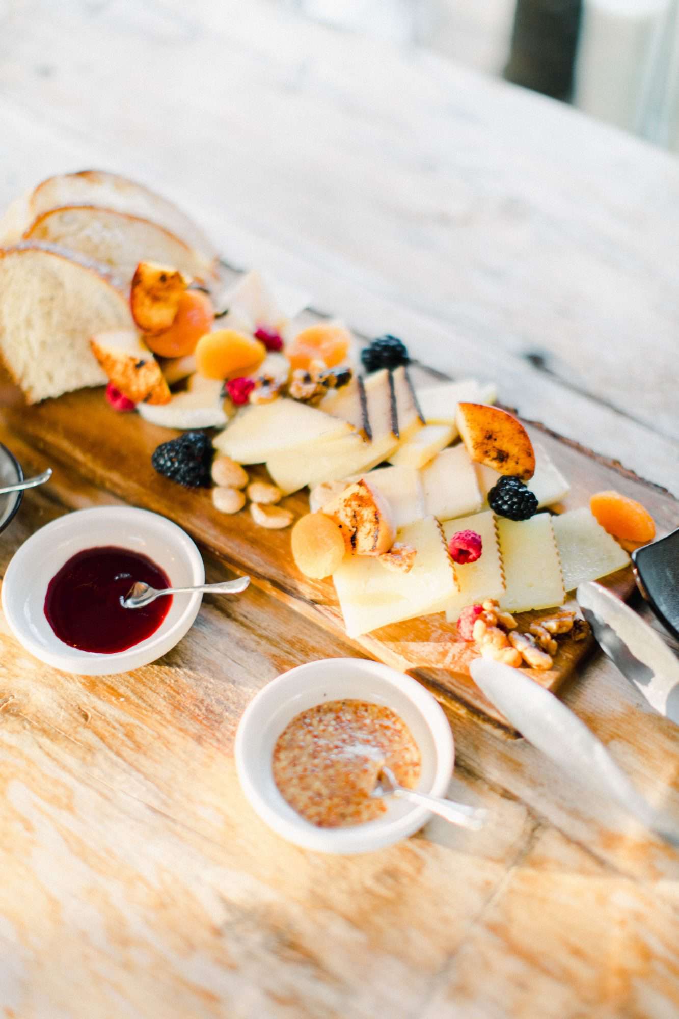 Charcuterie board with jam and sauces