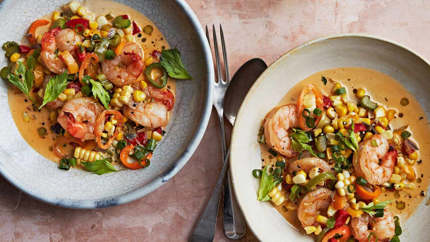 two bowls of shrimp maque choux