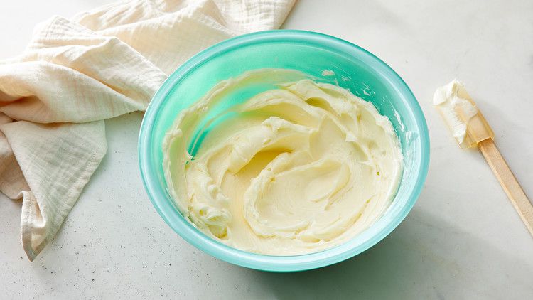 coconut buttercream in blue-green bowl