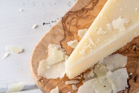 pecorino romano cheese on cutting board