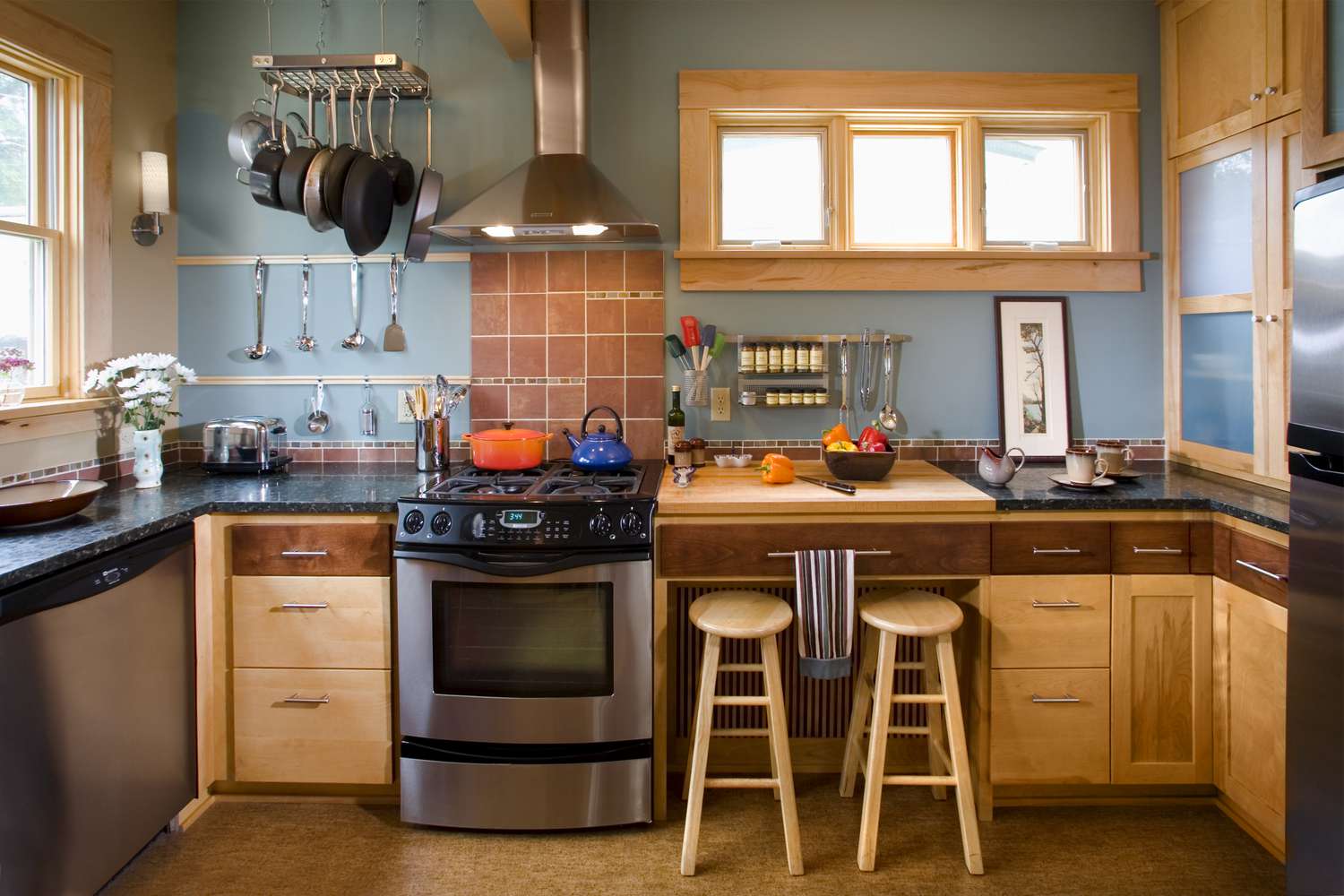 Kitchen With Wood Cabinets and Window Frames