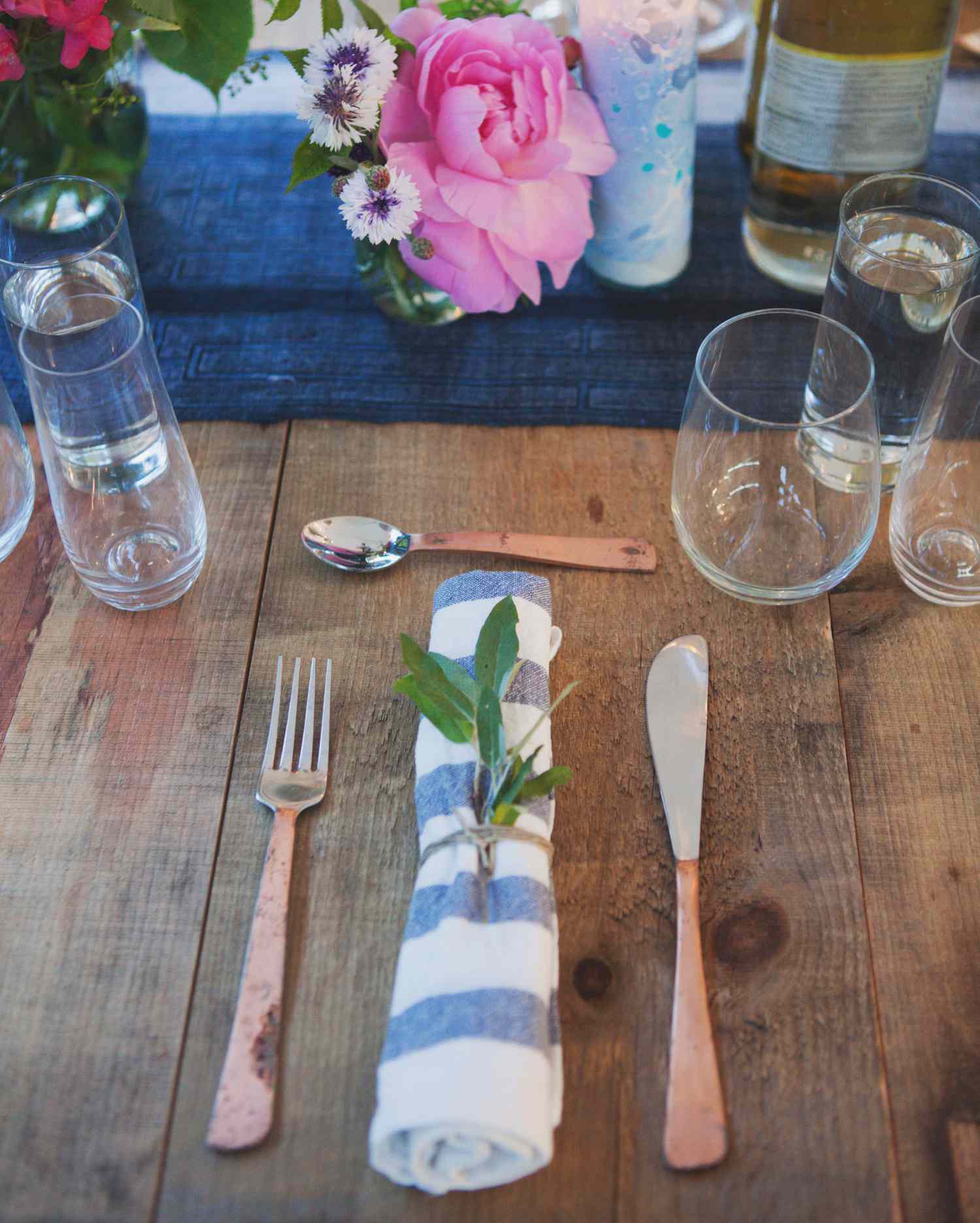 Blue, Orange, and Marble Table Setting