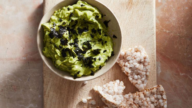 nori guacamole served with a rice cake