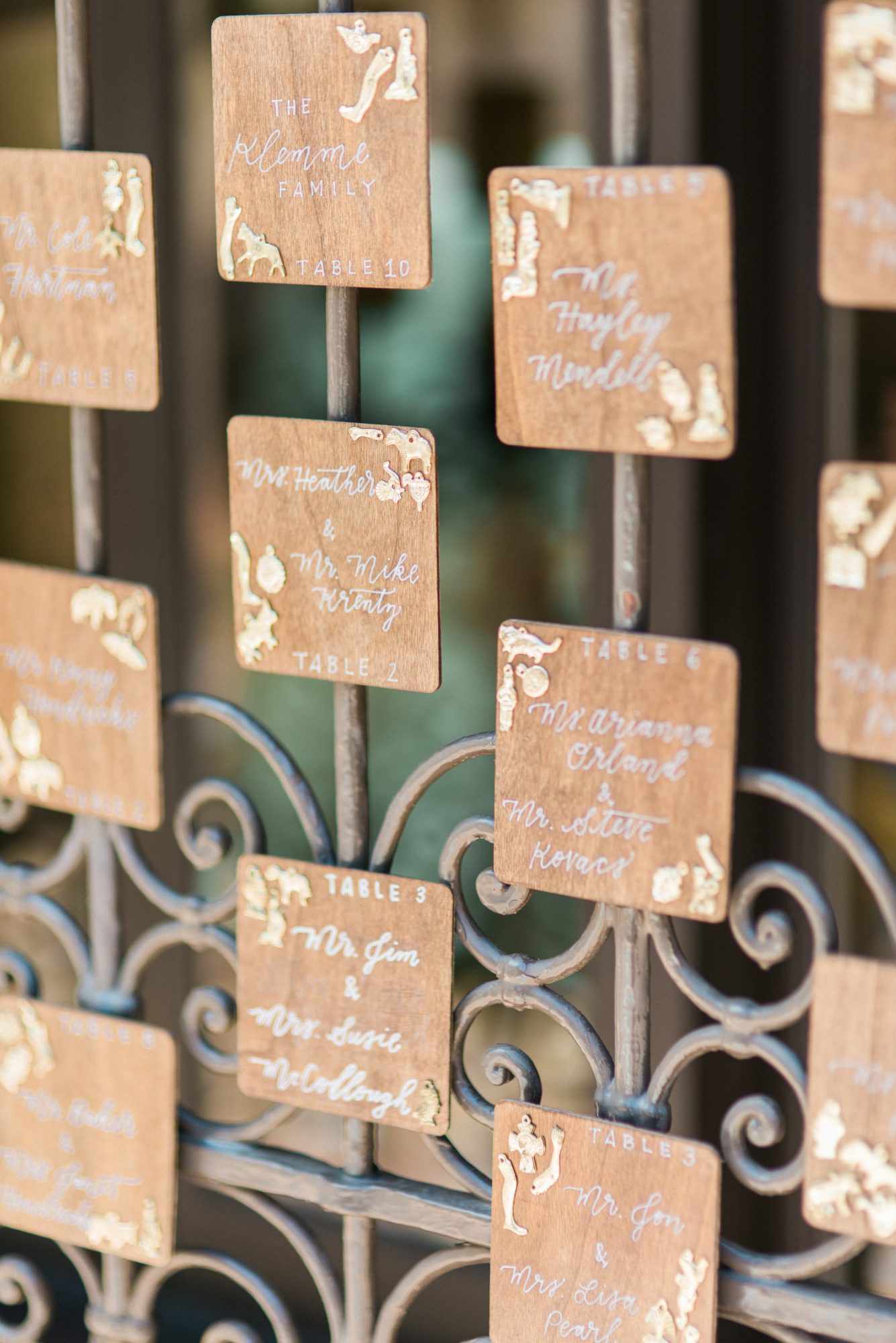 wooden seating card display on gate