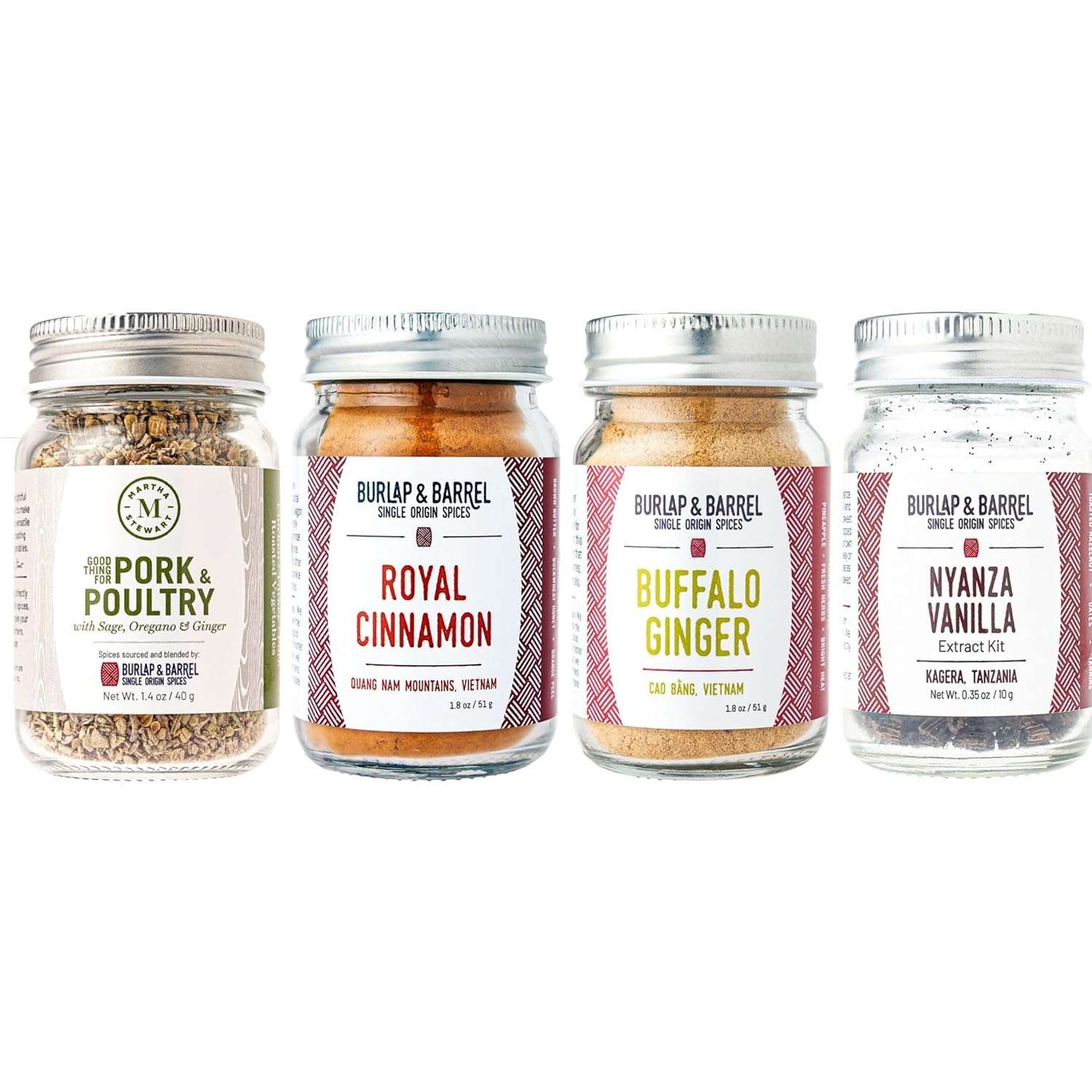 Four spice jars labeled Pork Poultry Royal Cinnamon Buffalo Ginger and Nyanza Vanilla arranged in a row