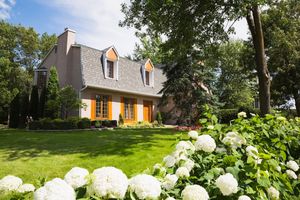 Modern home with wood accents, curb appeal