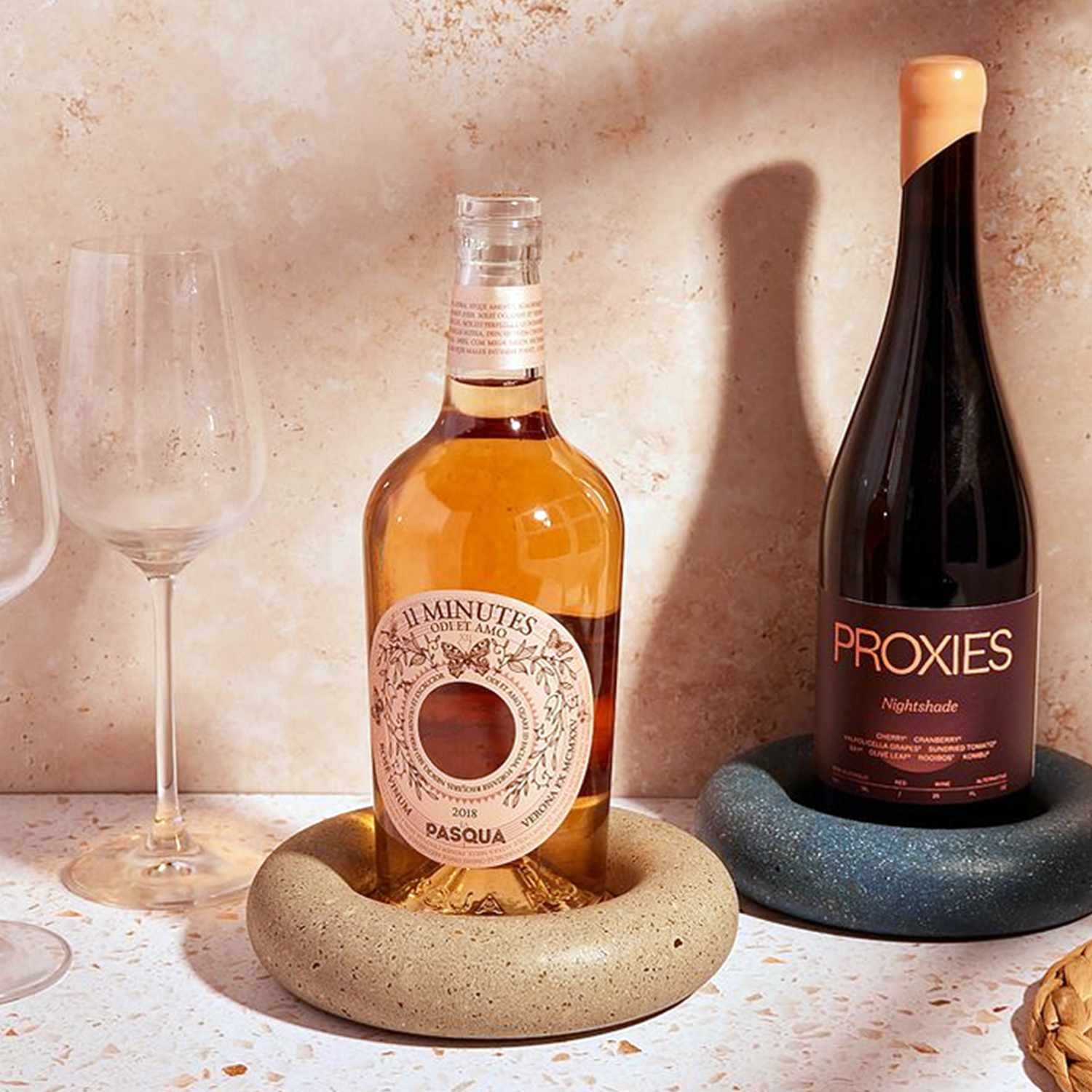 wine bottles with concrete coasters