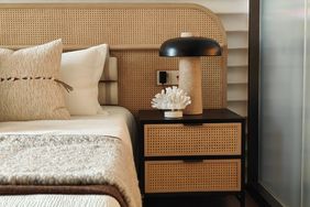 Bedroom with rattan bed and nightstand
