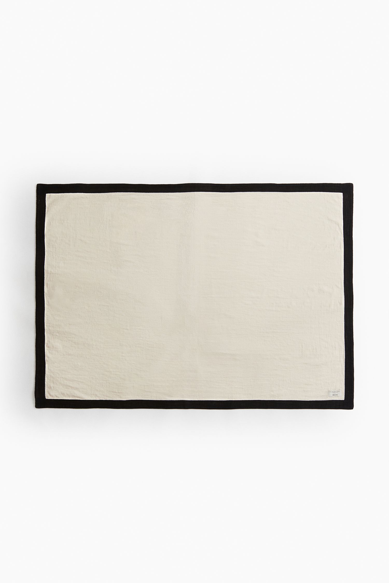 brown and white throw blanket