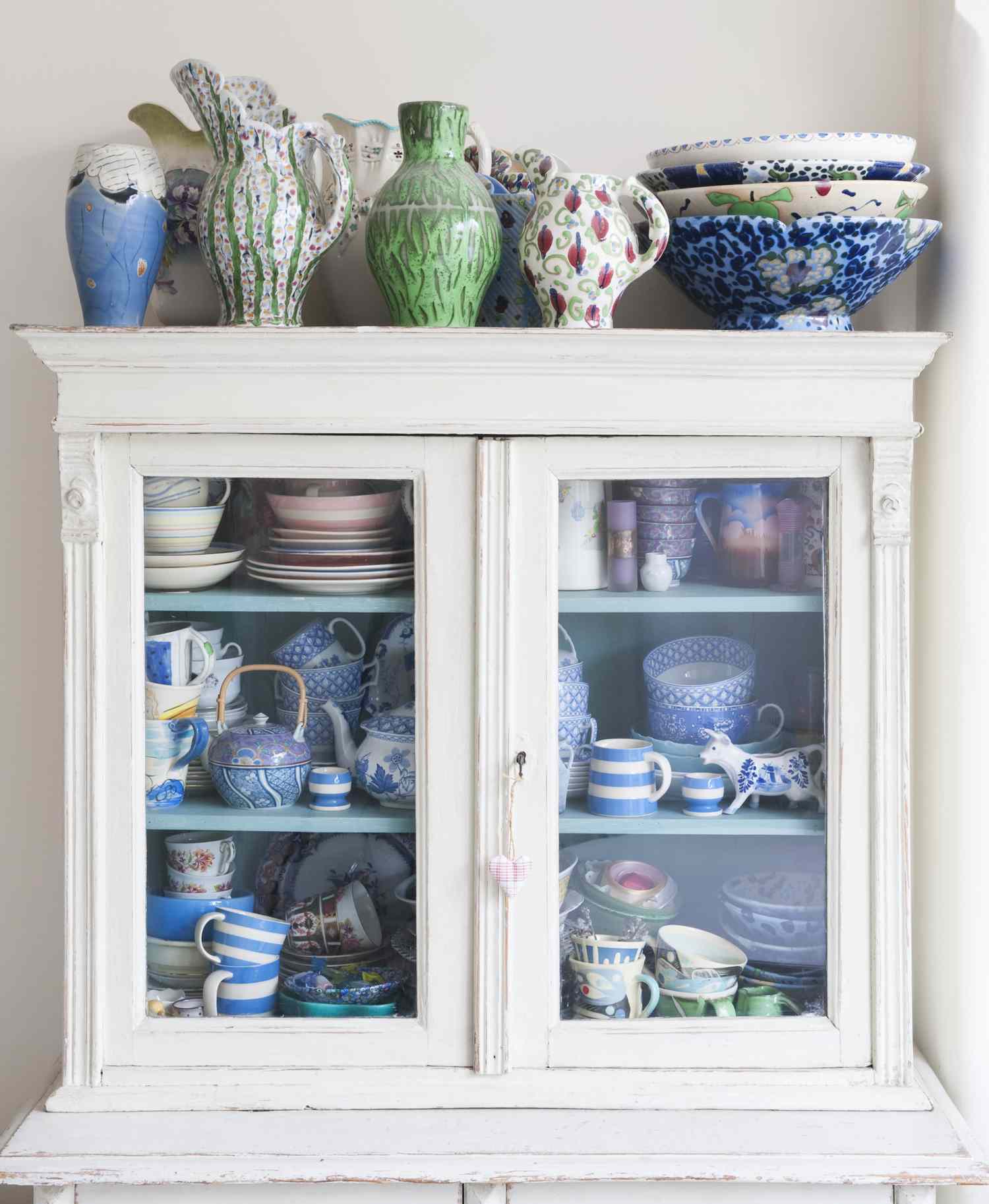 Storage cabinet with crockery