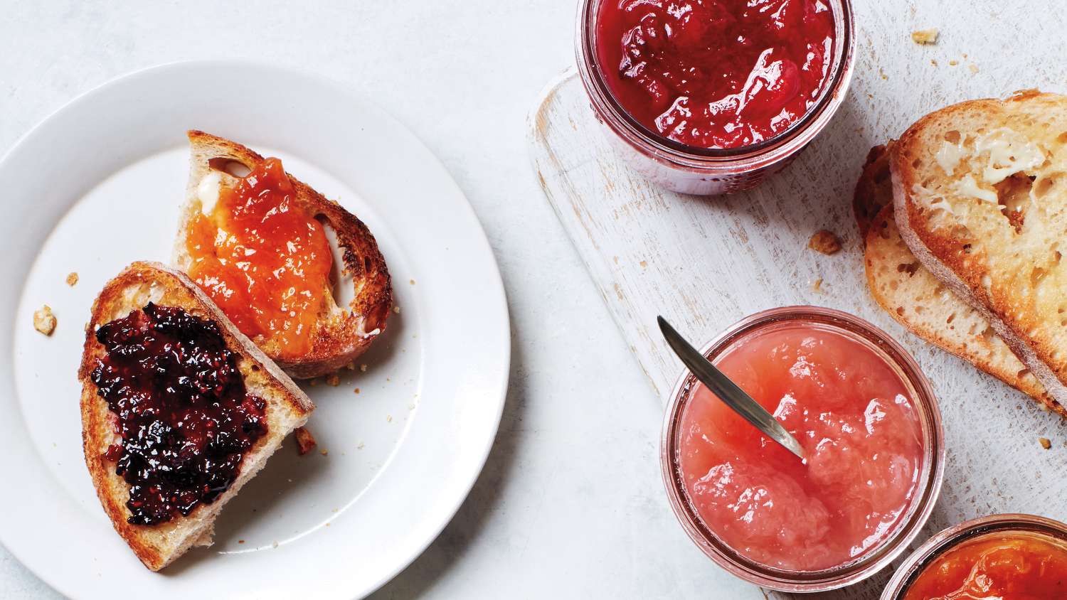 several fruit jams on toast from basic jam recipe