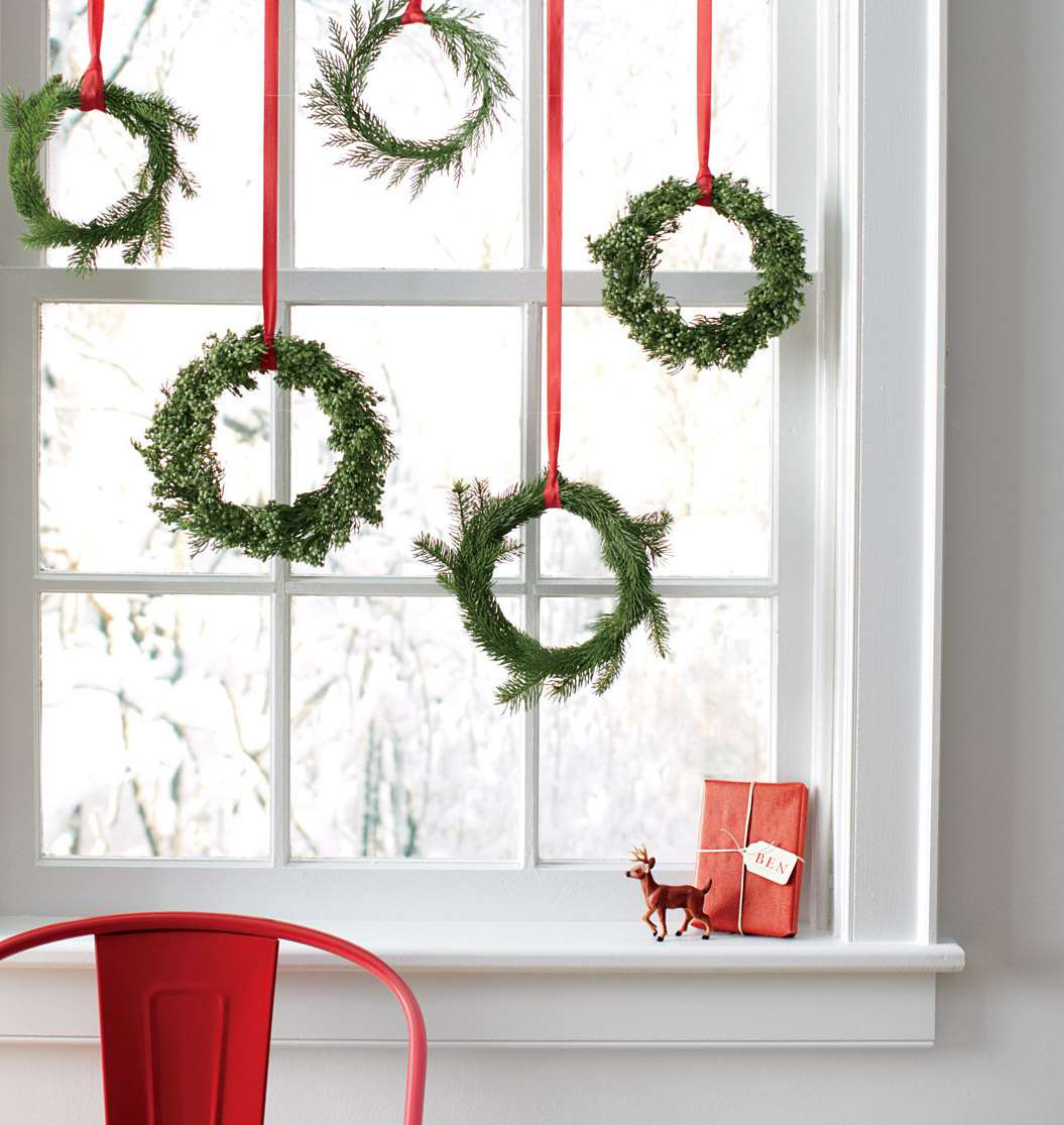 homemade wreaths in the window