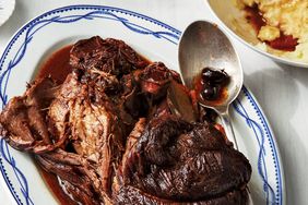 pressure cooker pot roast with dates olives and orange blue white serving tray