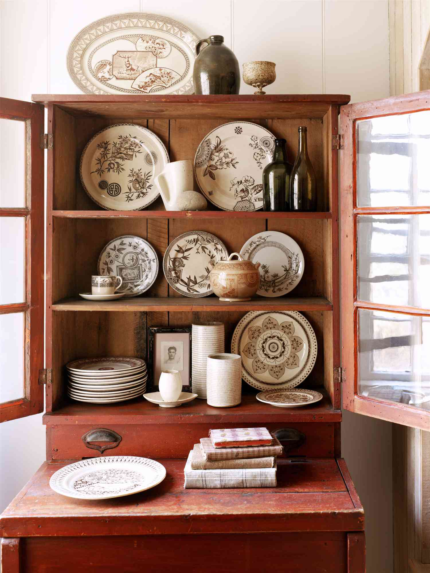 Cabinet of antique dishware