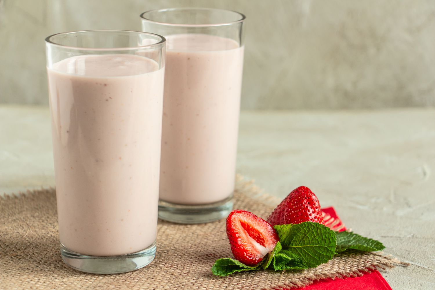 strawberry milk in tall glasses