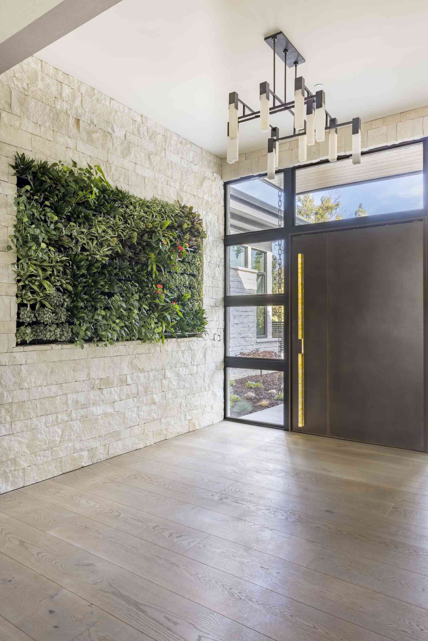 Entryway hallway with living plant wall