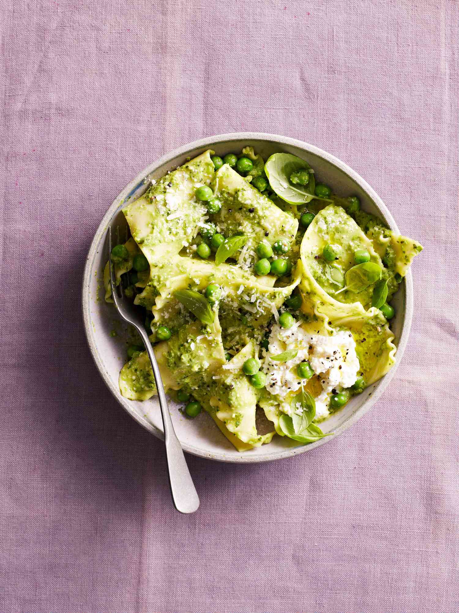 pea pesto handkerchiefs pasta in bowl with spoon