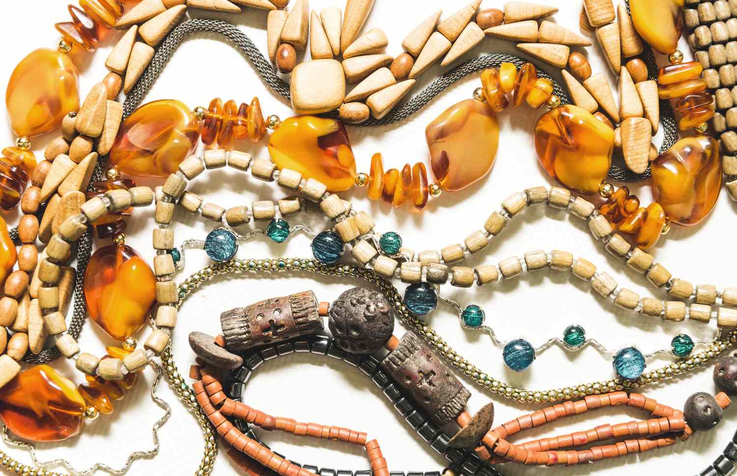 Assortment of necklaces with various beads and materials