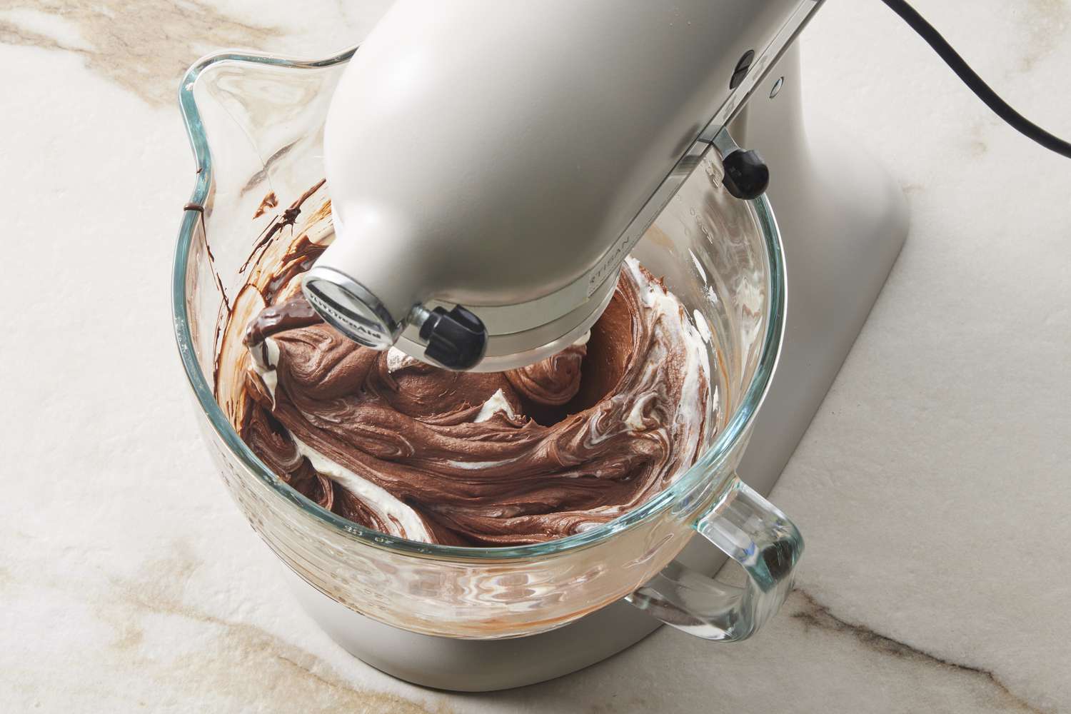 Chocolate frosting mixed in stand mixer