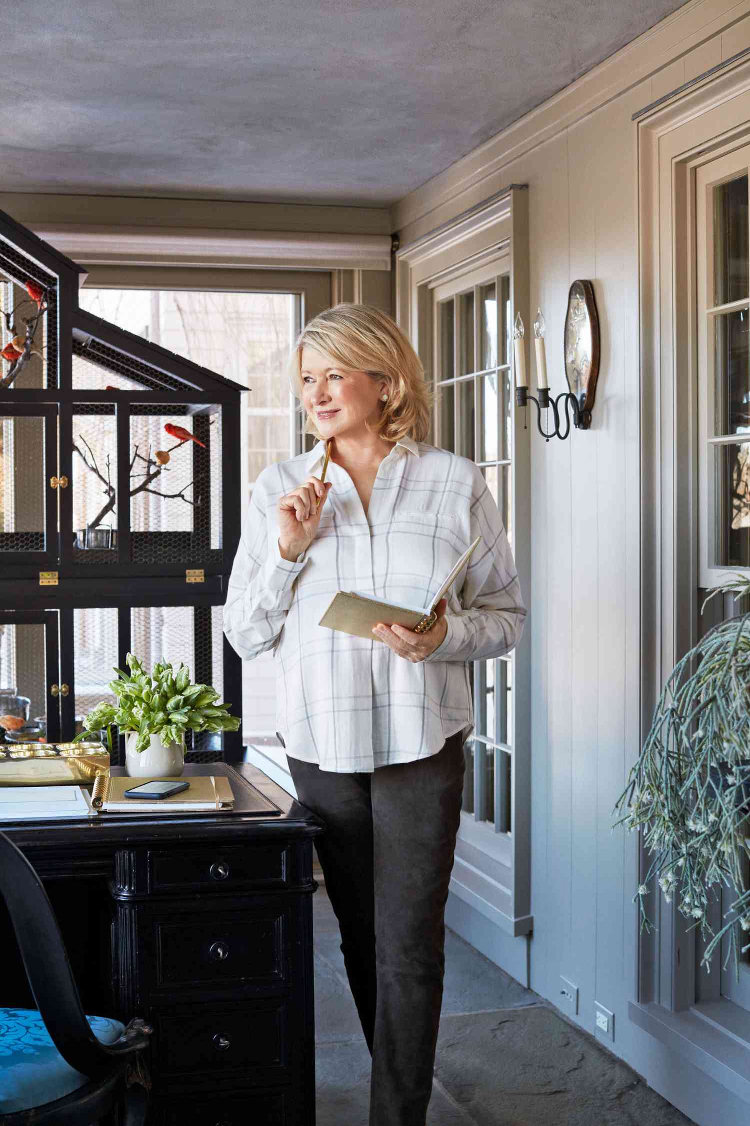 decorvow with pen and notebook in office