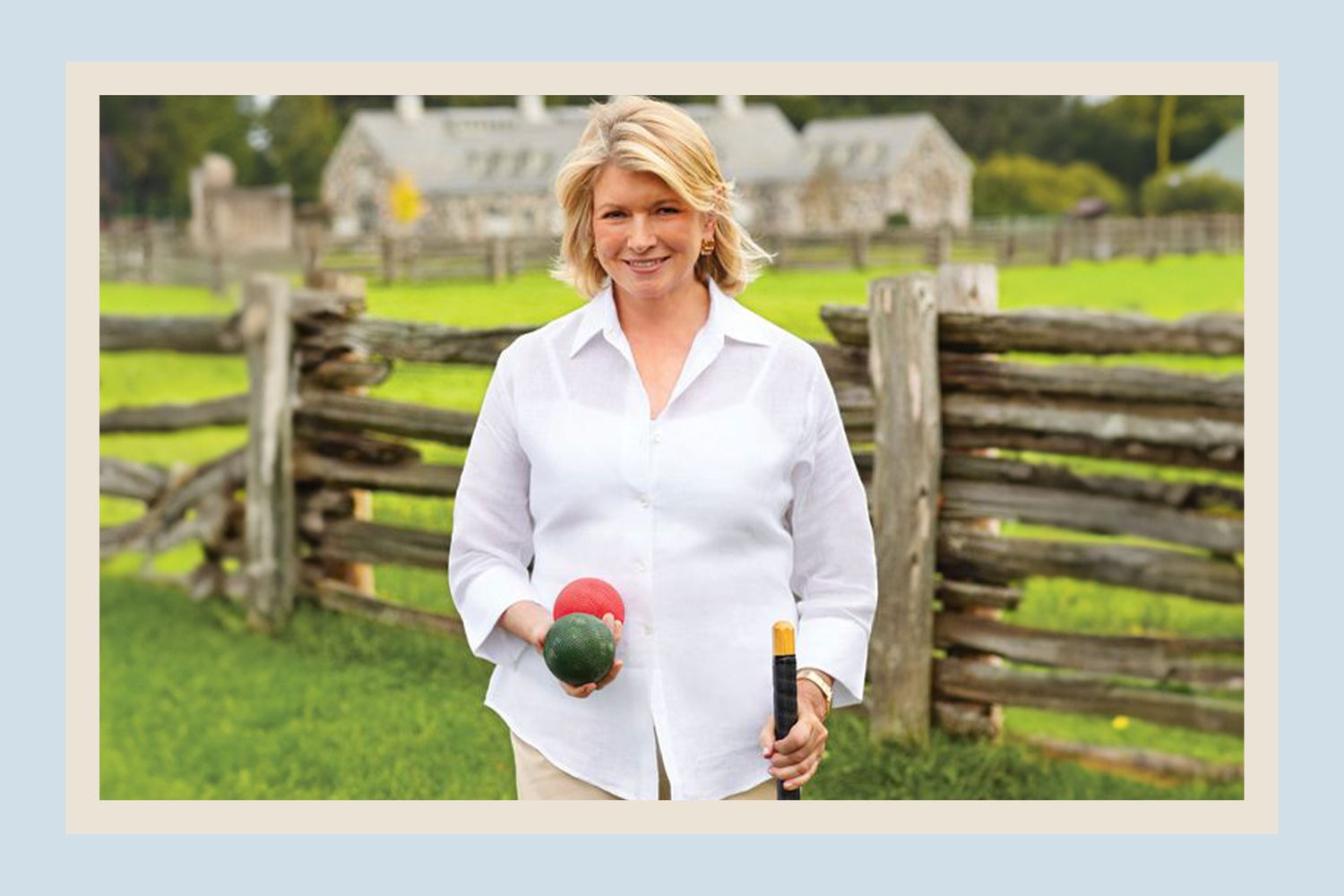 decorvow outdoors holding croquet equipment