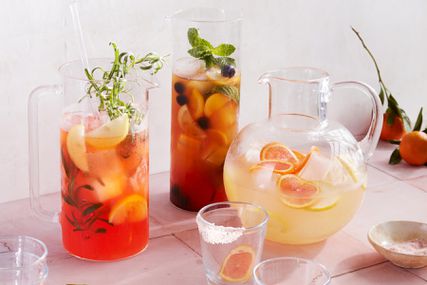 smoky lemon margarita in round glass pitcher