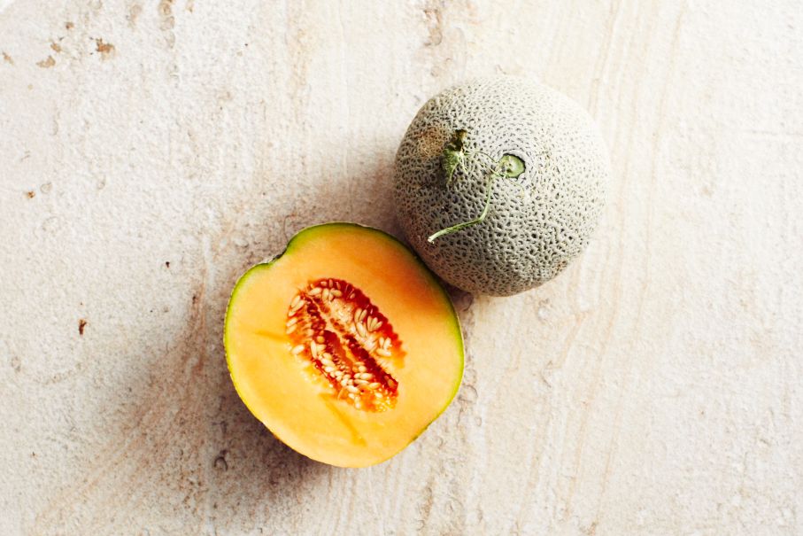 cut and whole cantaloupe