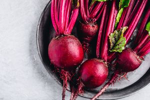red beets in dish with leaves