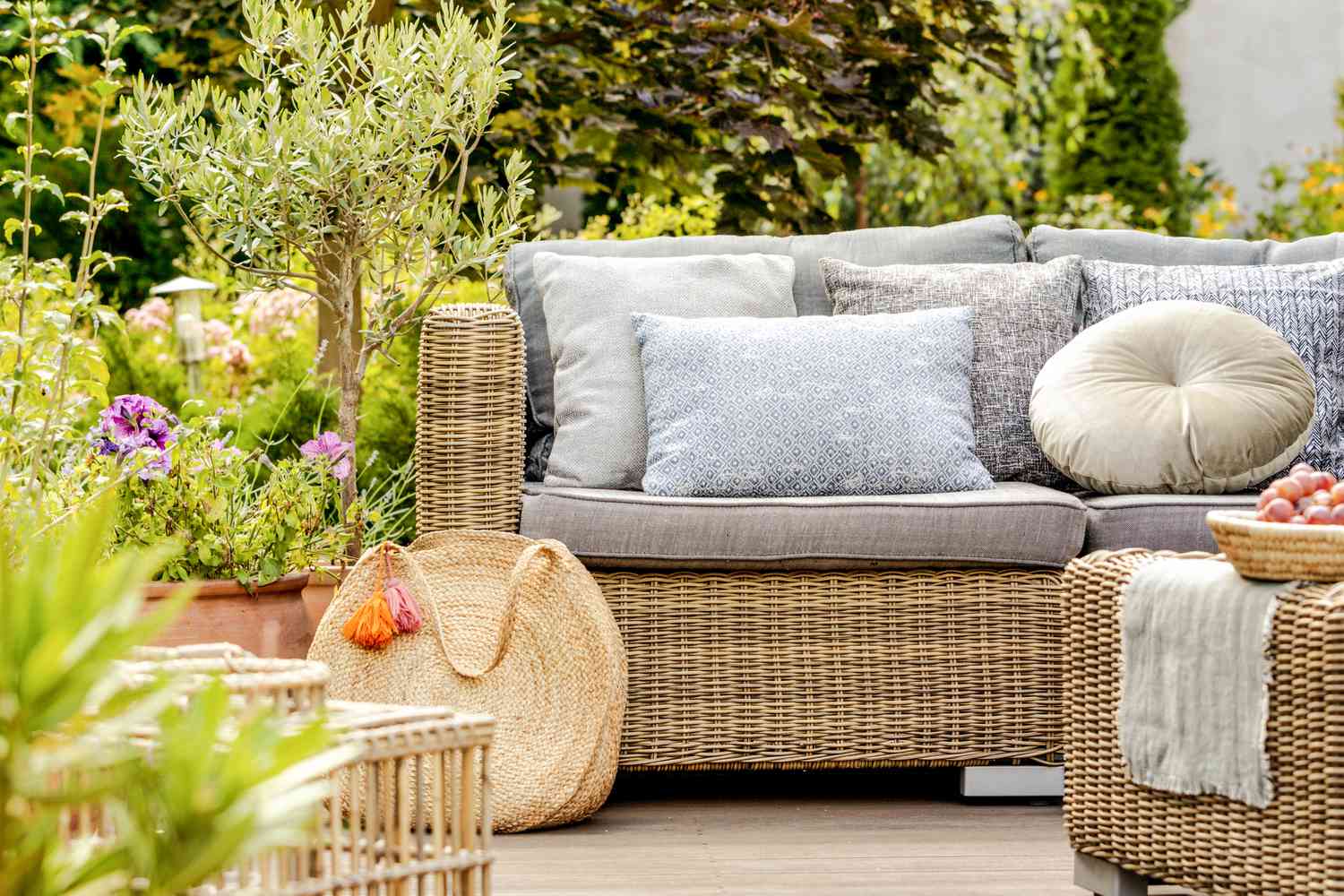 backyard furniture with pillows and decor