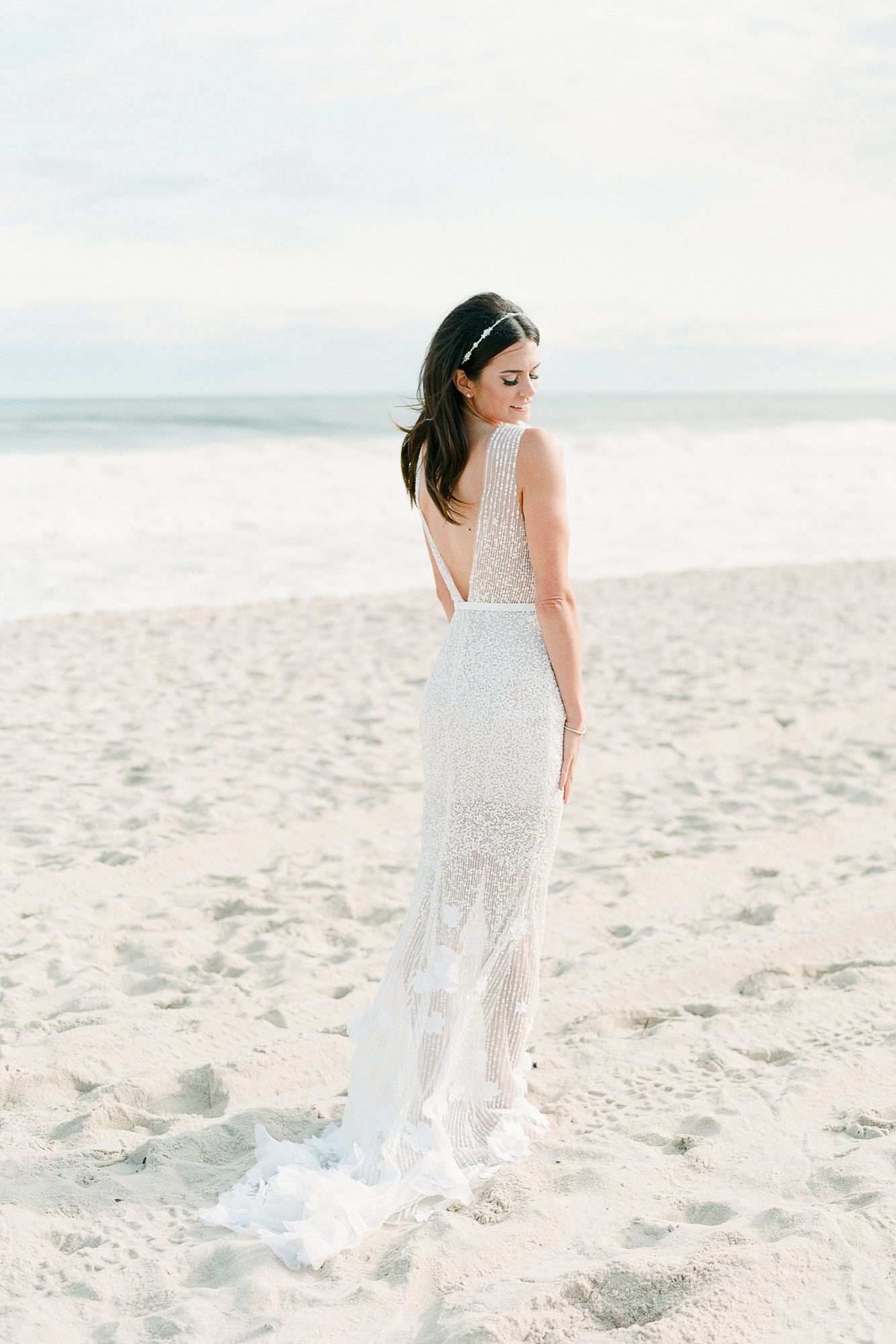 beach wedding dresses bride on white sand beach